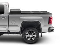 Solid Fold 2.0 Tool Box Tonneau Cover Black Textured Paint For Use w/Existing Tool Box Tool Box Not Included 2016-2024 Nissan Titan XD 6' 6 inch Bed without Utili-Track System Extang